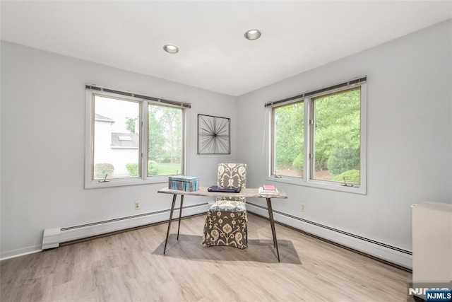 office with a baseboard radiator, wood finished floors, recessed lighting, and baseboards