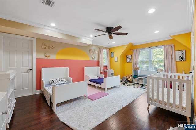 202 Elmwynd Dr, Orange, NJ 07050 - bedroom with crown molding, dark wood finished floors, recessed lighting, and baseboards