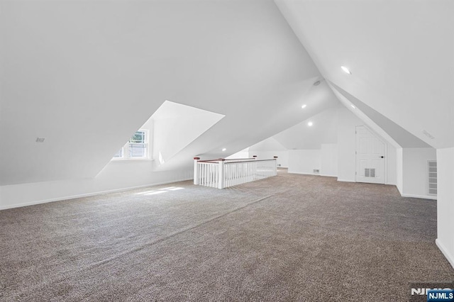 202 Elmwynd Dr, Orange, NJ 07050 - bonus room with vaulted ceiling, carpet, and baseboards
