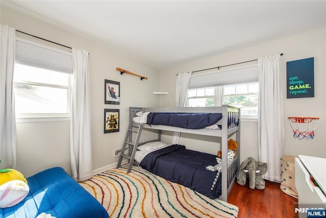 bedroom featuring wood finished floors