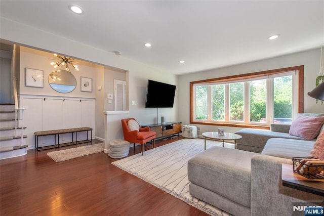 living area with recessed lighting and wood finished floors