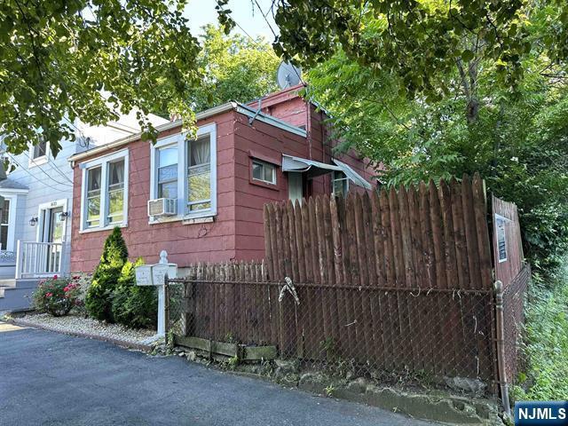3602 Liberty Ave, North Bergen, NJ 07047 - view of side of home featuring fence