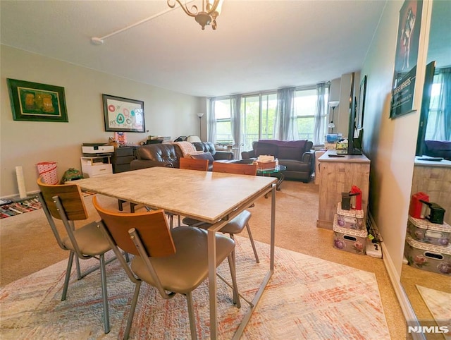 300 Main St Unit 216, Little Falls, NJ 07424 - dining space featuring light colored carpet