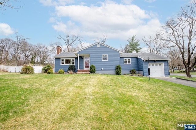 95 Page Dr, Oakland, NJ 07436 - view of front of home featuring driveway, a garage, and a chimney