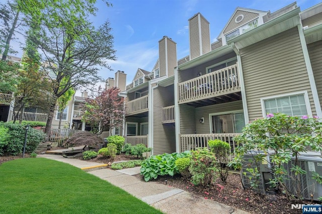 548 Windsor Dr Unit 548, Palisades Park, NJ 07650 - view of property with central AC unit