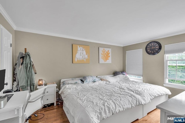 548 Windsor Dr Unit 548, Palisades Park, NJ 07650 - bedroom with ornamental molding and wood finished floors