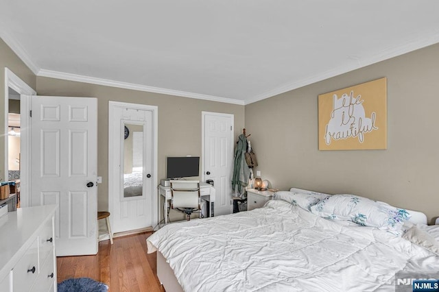 548 Windsor Dr Unit 548, Palisades Park, NJ 07650 - bedroom featuring ornamental molding and wood finished floors