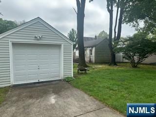 detached garage with driveway