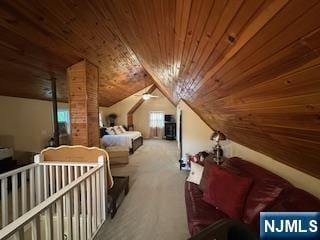 carpeted bedroom with wood ceiling and lofted ceiling