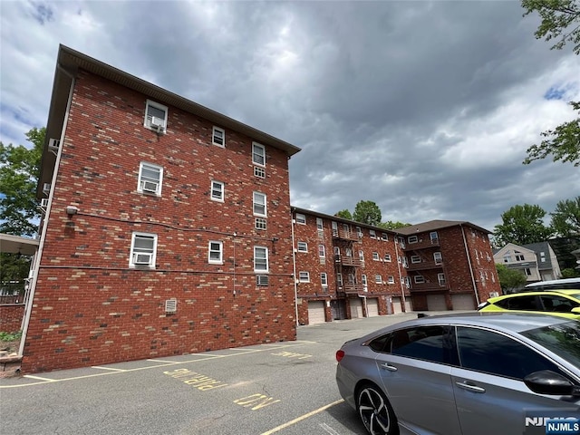 2430 8th St Unit 5B, Fort Lee, NJ 07024 - view of building exterior featuring uncovered parking
