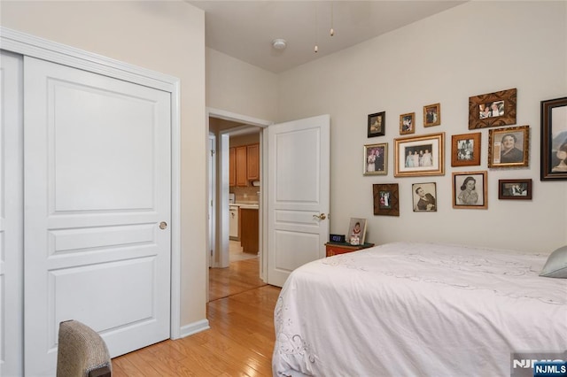 bedroom with light wood-style flooring