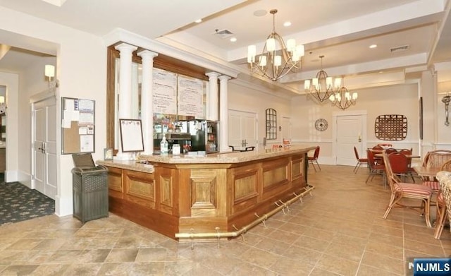 welcome area with a chandelier and recessed lighting