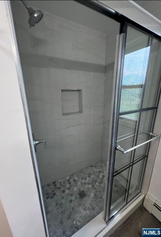 247 Ramapo Valley Rd, Oakland, NJ 07436 - bathroom with a stall shower and baseboard heating