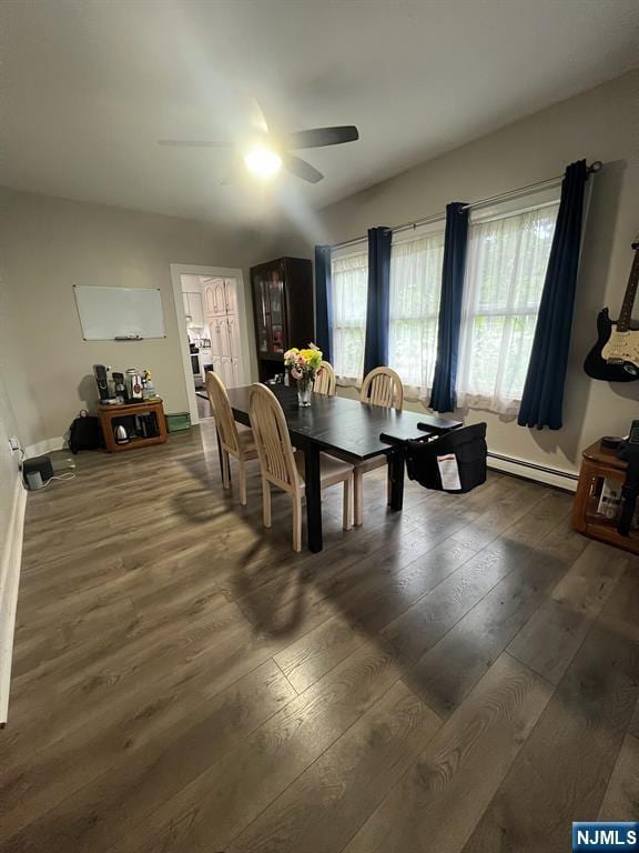 247 Ramapo Valley Rd, Oakland, NJ 07436 - dining area featuring ceiling fan, dark wood-style floors, a baseboard heating unit, and baseboards