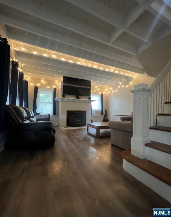 247 Ramapo Valley Rd, Oakland, NJ 07436 - living room with wood finished floors, stairs, beamed ceiling, and a fireplace