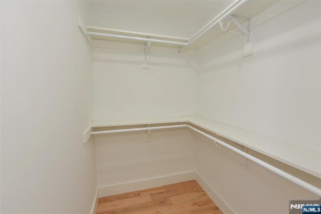 14 Charles Ter, Waldwick, NJ 07463 - walk in closet featuring light wood-type flooring