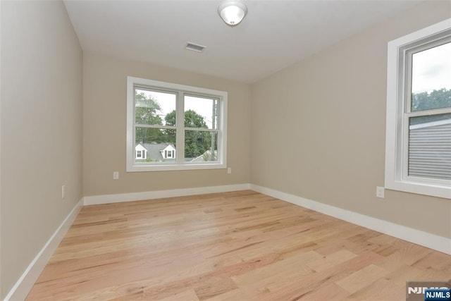 14 Charles Ter, Waldwick, NJ 07463 - spare room with light wood-style floors and baseboards