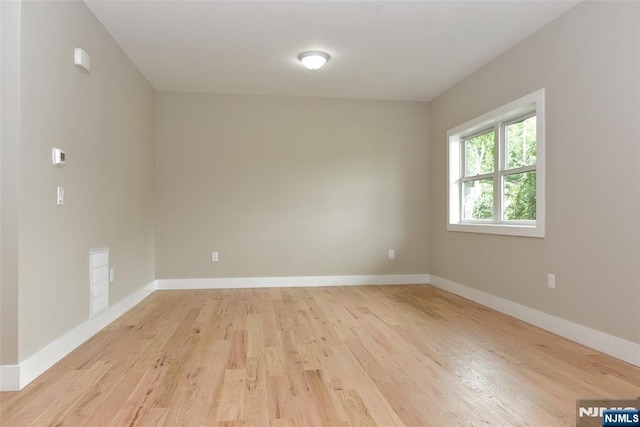 14 Charles Ter, Waldwick, NJ 07463 - unfurnished room with light wood-type flooring and baseboards