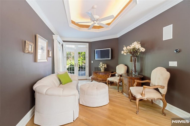 14 Stewart Ct, Old Tappan, NJ 07675 - living area with ceiling fan, a tray ceiling, light wood-type flooring, ornamental molding, and baseboards