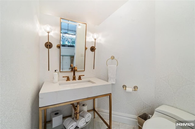 14 Stewart Ct, Old Tappan, NJ 07675 - bathroom with toilet, baseboards, and vanity