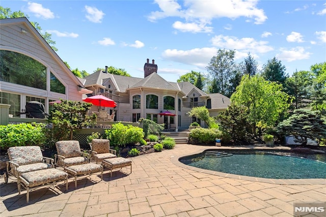 14 Stewart Ct, Old Tappan, NJ 07675 - outdoor pool featuring a patio area