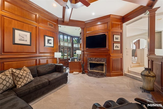 14 Stewart Ct, Old Tappan, NJ 07675 - carpeted living area with ceiling fan, decorative columns, a fireplace, ornamental molding, and arched walkways