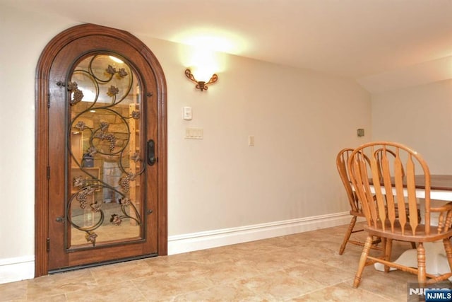 70 Oak Dr, Upper Saddle River, NJ 07458 - dining room featuring arched walkways and baseboards