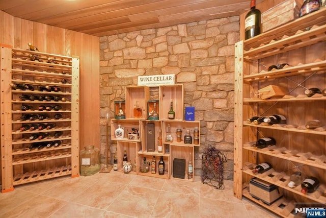 70 Oak Dr, Upper Saddle River, NJ 07458 - wine room featuring wooden ceiling and tile patterned flooring