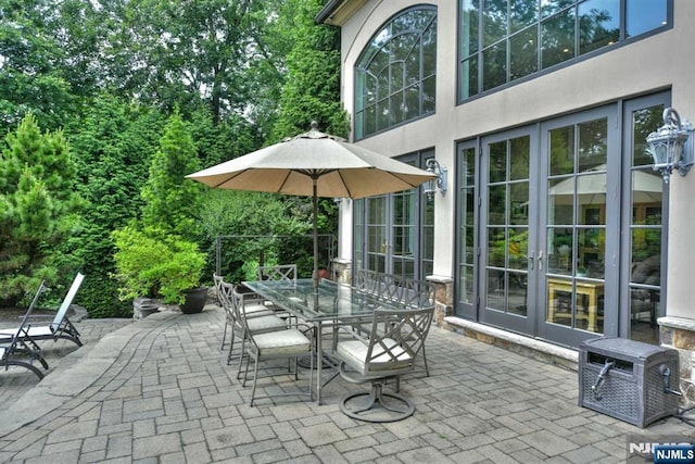 70 Oak Dr, Upper Saddle River, NJ 07458 - view of patio featuring french doors and outdoor dining area