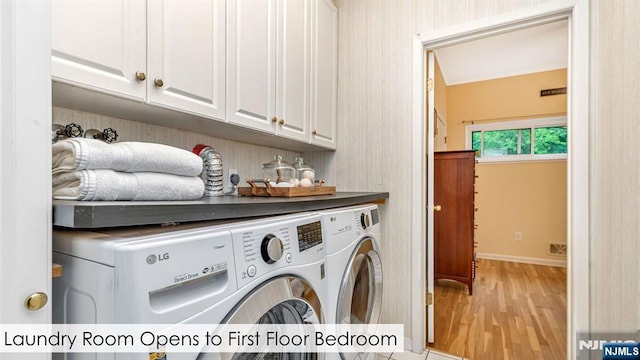 108 Buckhaven Hl, Upper Saddle River, NJ 07458 - clothes washing area featuring cabinet space, light wood-style flooring, separate washer and dryer, and baseboards