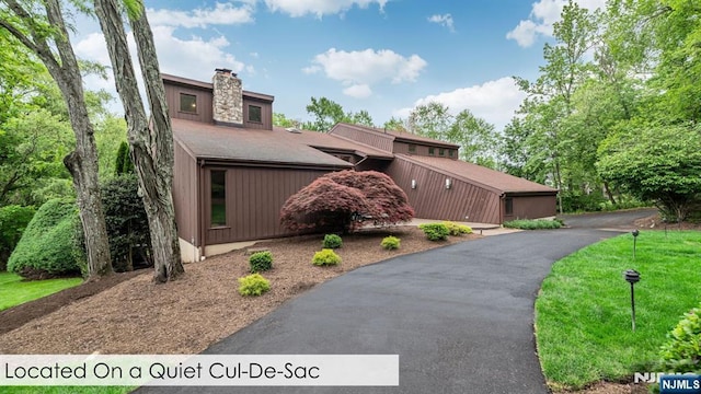 108 Buckhaven Hl, Upper Saddle River, NJ 07458 - mid-century modern home with a chimney