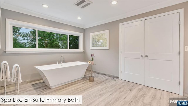 108 Buckhaven Hl, Upper Saddle River, NJ 07458 - full bath featuring wood finished floors, a freestanding bath, crown molding, baseboards, and recessed lighting