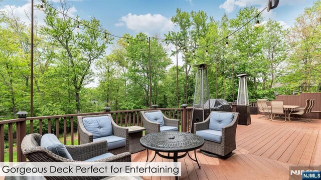 108 Buckhaven Hl, Upper Saddle River, NJ 07458 - wooden deck featuring outdoor dining space and an outdoor living space