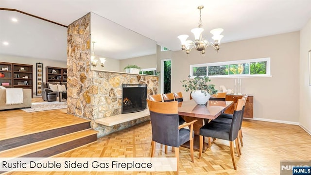 108 Buckhaven Hl, Upper Saddle River, NJ 07458 - dining space featuring a chandelier, baseboards, a stone fireplace, and recessed lighting