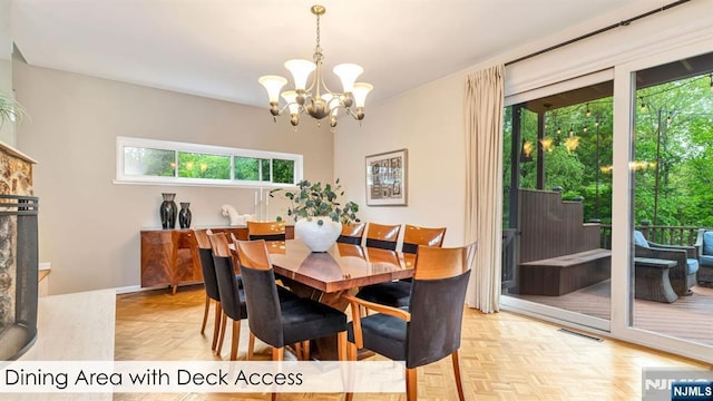 108 Buckhaven Hl, Upper Saddle River, NJ 07458 - dining area featuring a chandelier