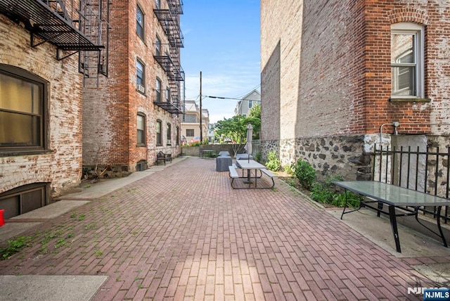 1055 Boulevard Blvd Unit D3, Weehawken, NJ 07086 - surrounding community with a patio and fence