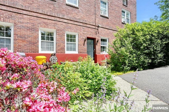 927 Commonwealth Dr Unit 4, Teaneck, NJ 07666 - doorway to property with brick siding