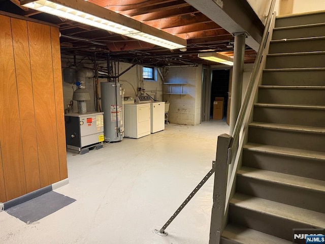 384 Audubon Rd, Englewood, NJ 07631 - below grade area with water heater, washing machine and clothes dryer, and stairs