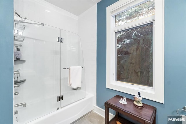 8709 Churchill Rd, North Bergen, NJ 07047 - full bath featuring bath / shower combo with glass door, baseboards, ornamental molding, and tile patterned flooring