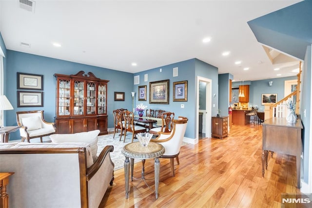 8709 Churchill Rd, North Bergen, NJ 07047 - living area featuring light wood-style floors, baseboards, and recessed lighting