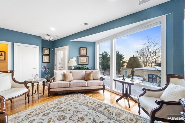 8709 Churchill Rd, North Bergen, NJ 07047 - living room with wood finished floors