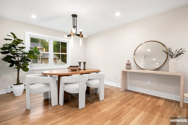 246 Oakwood Dr, Paramus, NJ 07652 - dining space with light wood-style flooring, a chandelier, recessed lighting, and baseboards