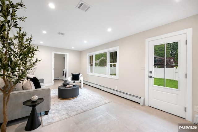 246 Oakwood Dr, Paramus, NJ 07652 - living area with a baseboard radiator, healthy amount of natural light, and recessed lighting