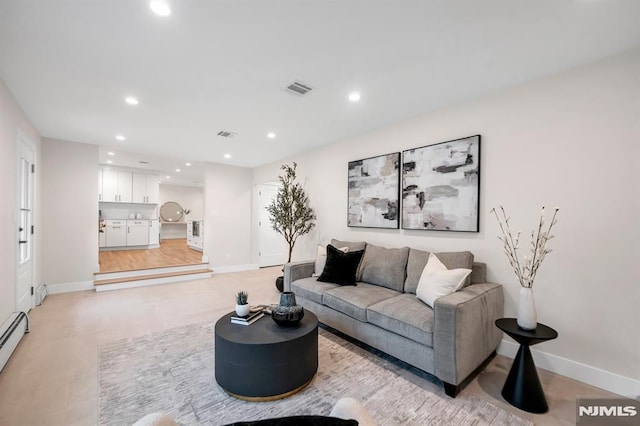 246 Oakwood Dr, Paramus, NJ 07652 - living area featuring recessed lighting, baseboards, and baseboard heating