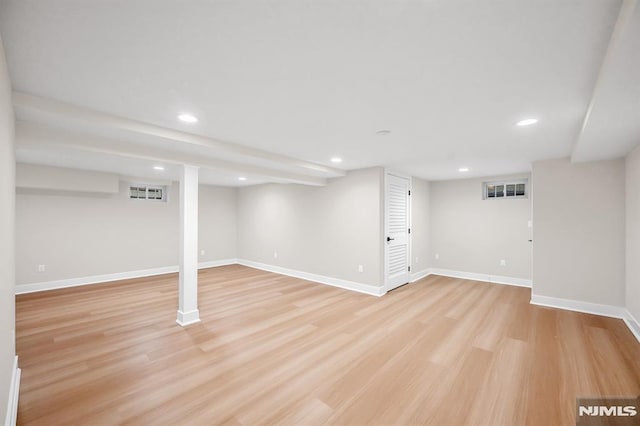 246 Oakwood Dr, Paramus, NJ 07652 - finished below grade area with light wood finished floors, baseboards, and recessed lighting