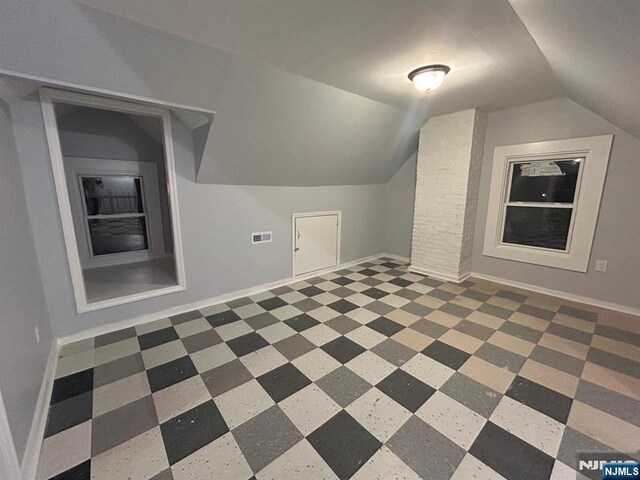 257 New St, Orange, NJ 07050 - additional living space with lofted ceiling and baseboards