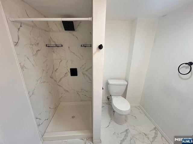 257 New St, Orange, NJ 07050 - full bath featuring marble finish flooring, toilet, a marble finish shower, and baseboards