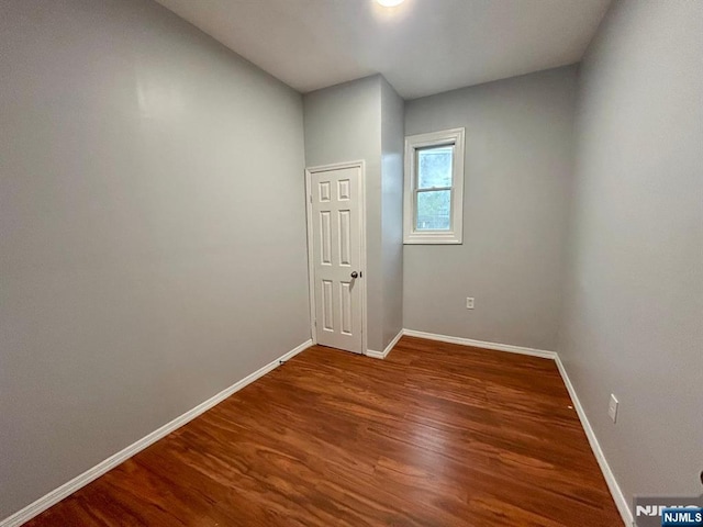257 New St, Orange, NJ 07050 - spare room with wood finished floors and baseboards