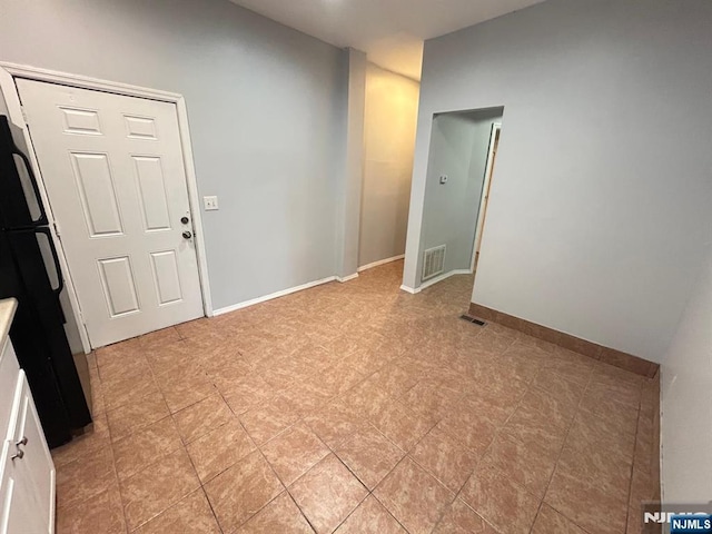 257 New St, Orange, NJ 07050 - empty room featuring baseboards