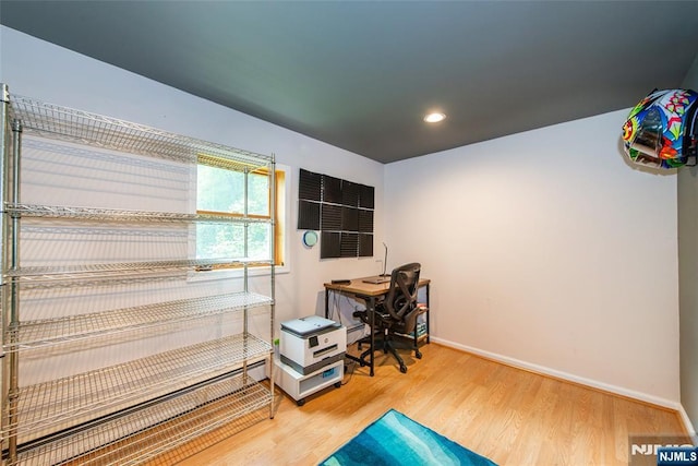 home office with wood finished floors, baseboards, recessed lighting, and baseboard heating